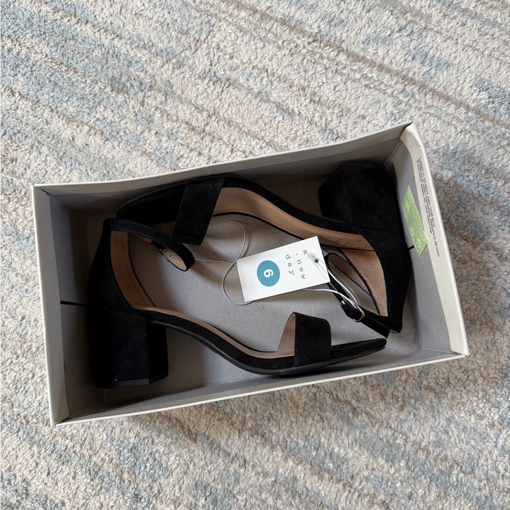 a new day • suede heels (black)